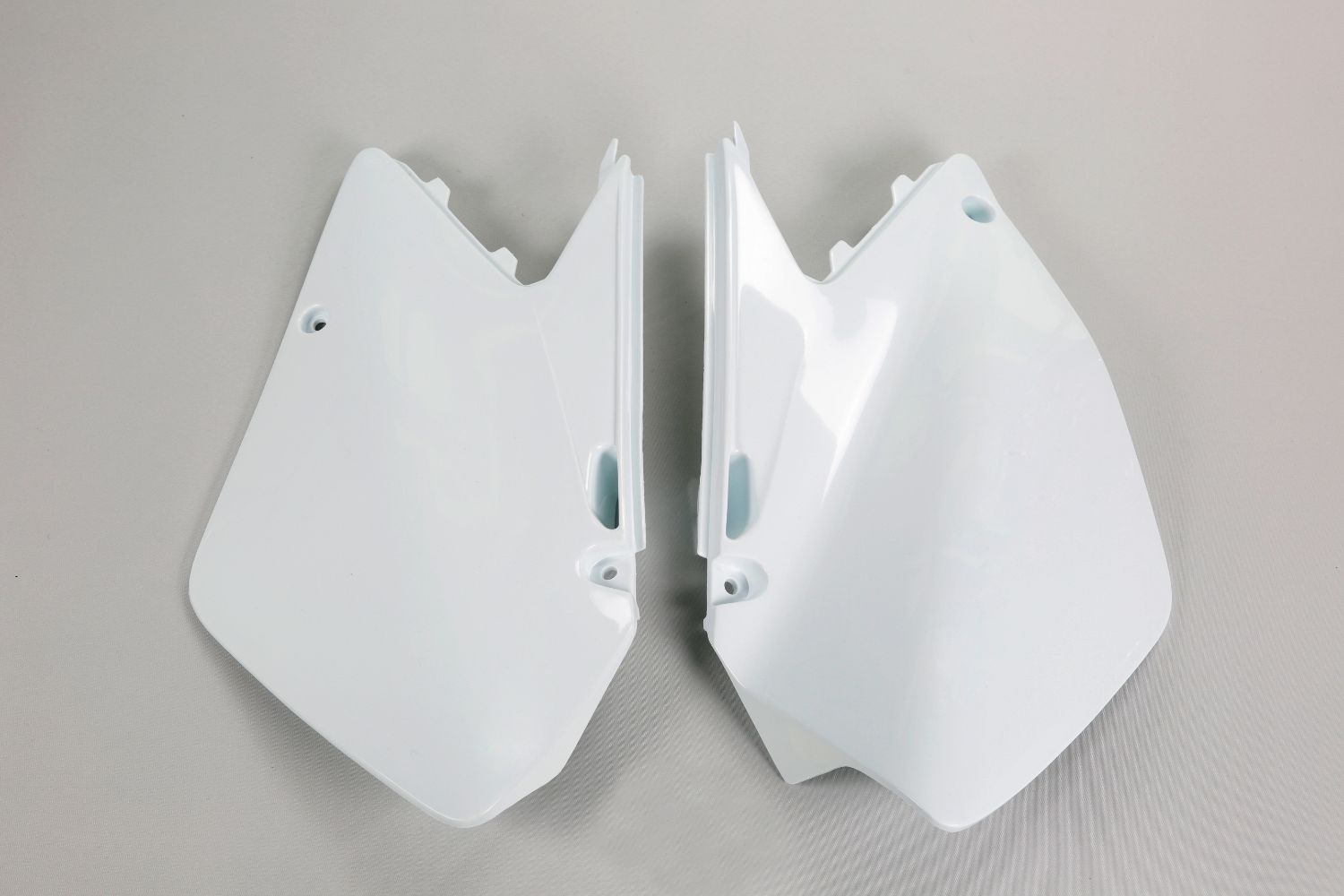 UFO Plast Fianchetti laterali portanumero Suzuki RM 125 2006-2012